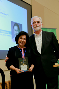 California Community Foundation's CEO Antonia Hernandez poses with her Civic Legacy plaque and with Community Partners' CEO Paul Vandeventer