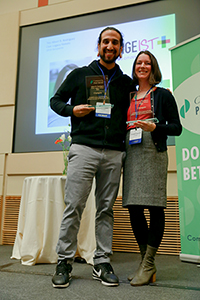 Changeist's Mario Fedelin and Beth Marco Bayouth pose with their Civic Legacy Honoree Plaque